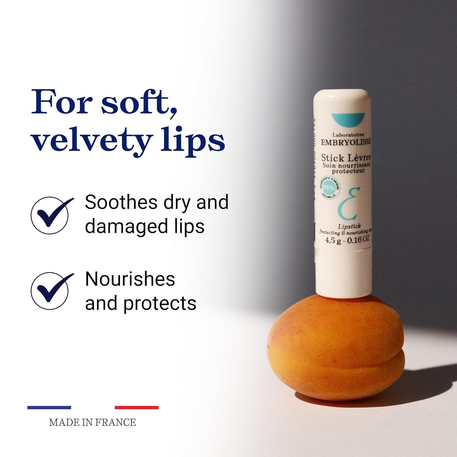 Embryolisse Protective & Nourishing Lip Balm skincare stick displayed on a neutral surface, emphasizing soft, velvety lips and a nourishing, protective lip care formula made in France.