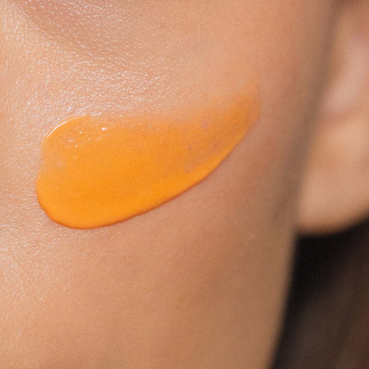 Texture and color detail of the Radiant Complexion Cream (Apricot shade)  - Embryolisse