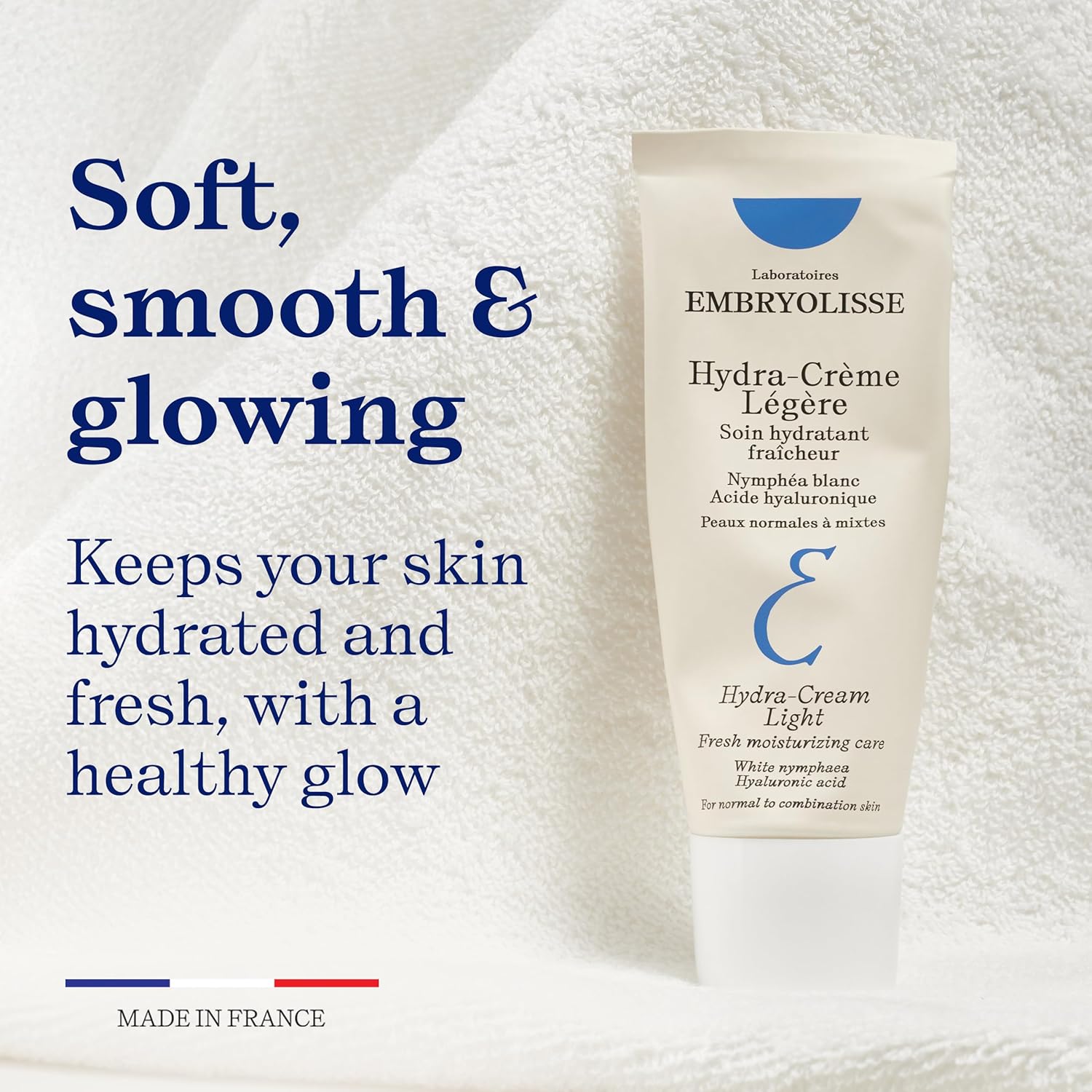 Embryolisse Hydra-Cream Light tube on a white towel with promotional text.