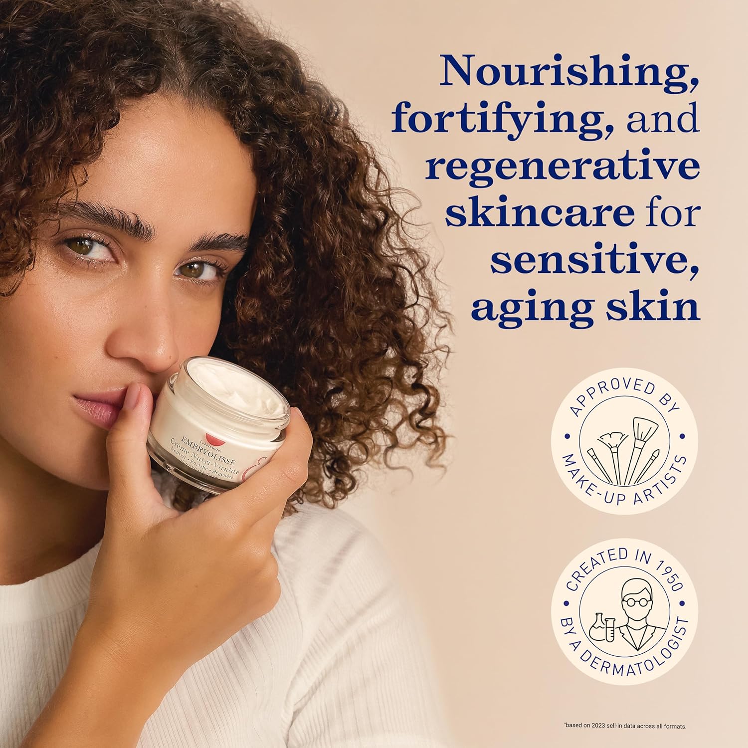 Woman holdingNutri-Vitality anti-aging skincare cream jar with text about nourishing and regenerative skincare for sensitive aging skin.