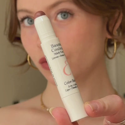 Video showcasing Embryolisse Artist Secret Color Balm 3-in-1 Stick Mocha in use, highlighting its multi-use application on lips, cheeks, and eyes. The video demonstrates the creamy texture, smooth glide, and easy blendability of the balm, with close-ups of the warm mocha shade applied for a natural, “no-makeup” finish. The product is shown on different areas of the face to illustrate versatility, comfort on sensitive skin, and an even, soft color payoff suitable for everyday wear.