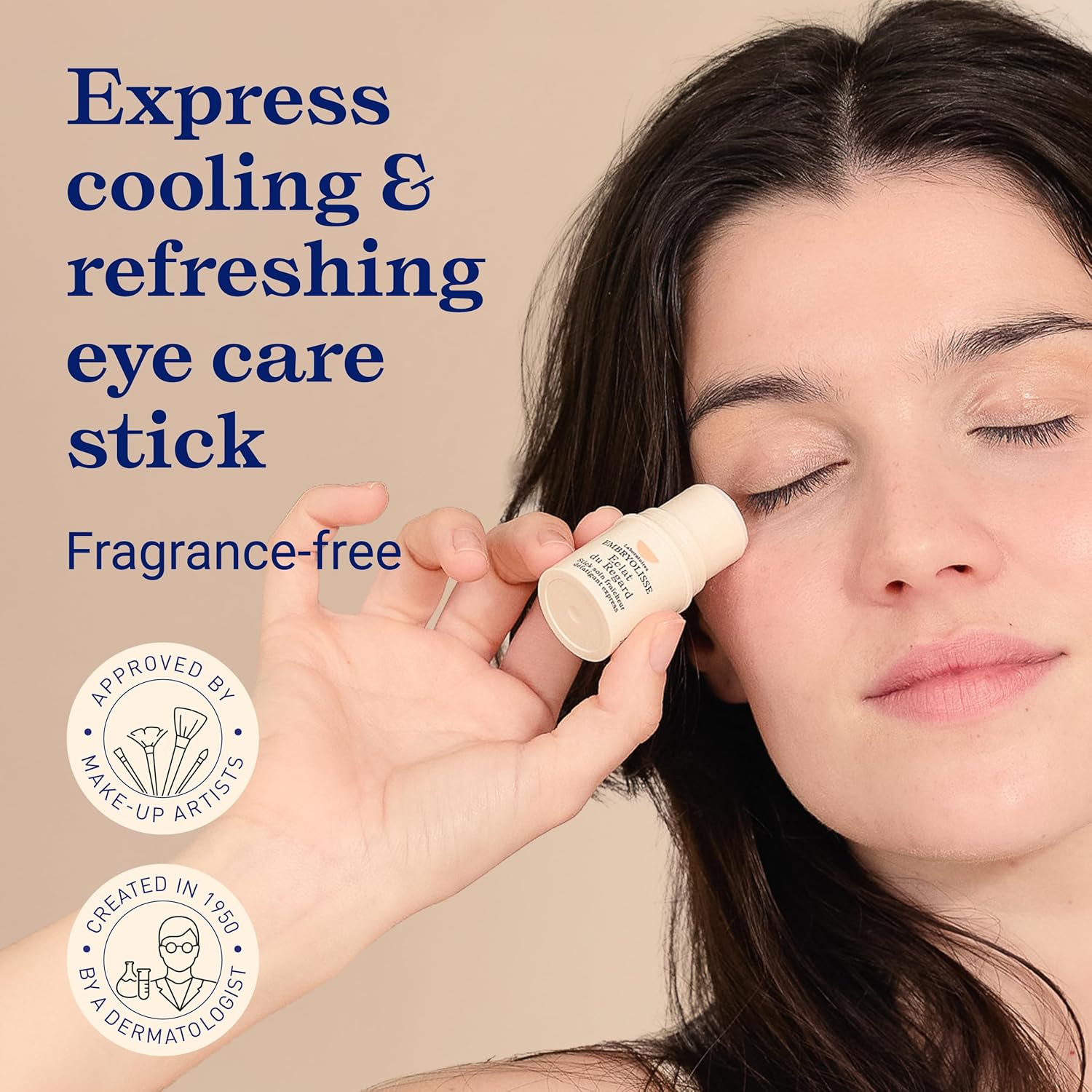 Woman applying Embryolisse Radiant Eye Stick on her eye contour with text and icons on a beige background